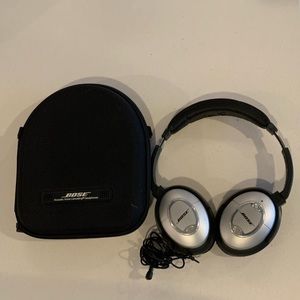 Bose Noise Canceling Headphones.  Wired & include 35mm to iPhone Jack adapter.